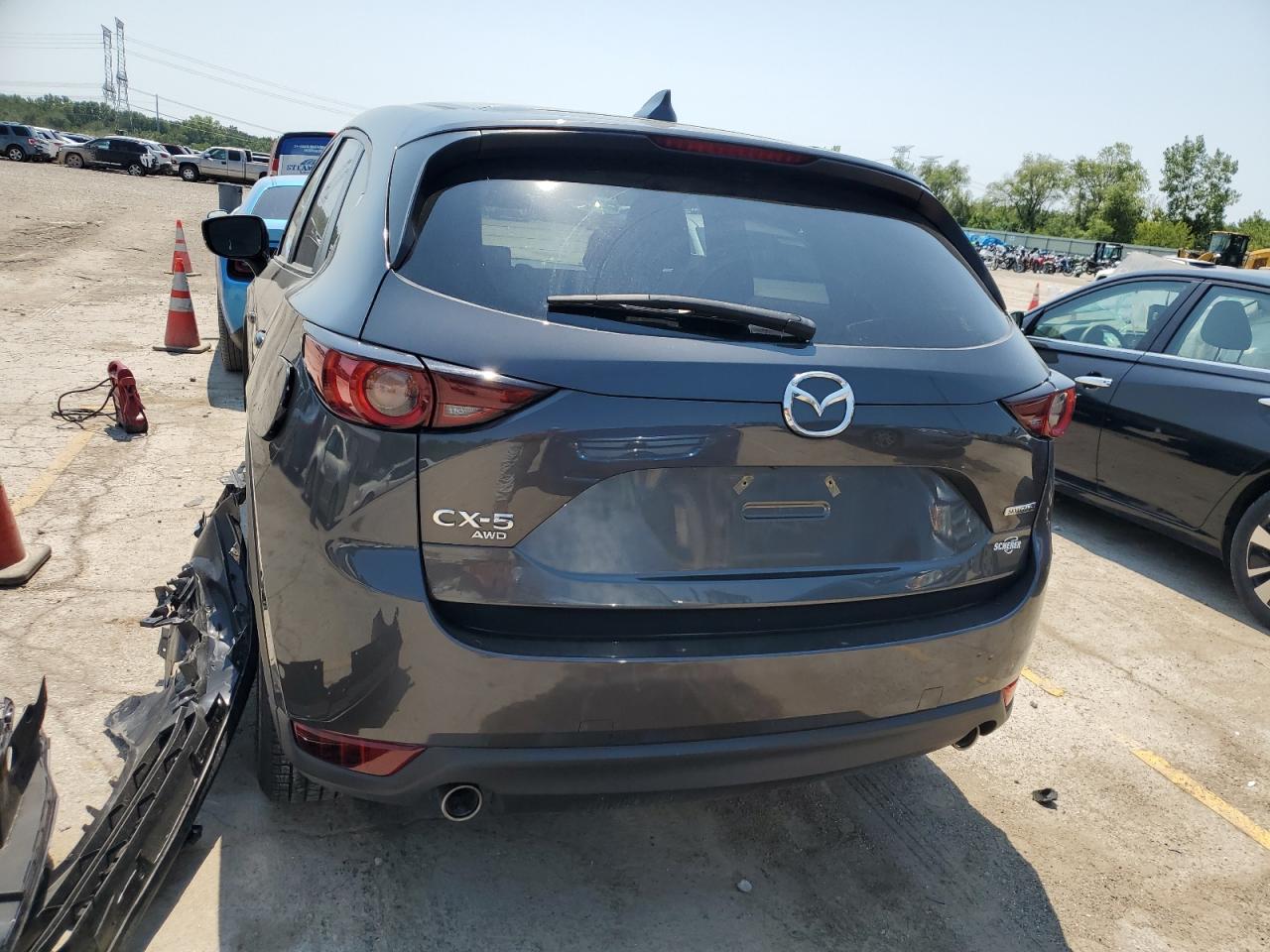 2021 Mazda Cx-5 Touring VIN: JM3KFBCM6M0489230 Lot: 65566554