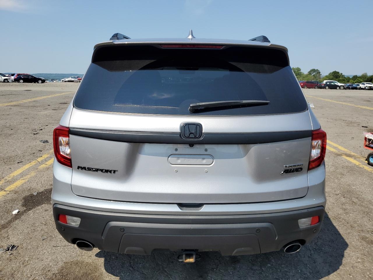 2021 Honda Passport Touring VIN: 5FNYF8H97MB016920 Lot: 65713794