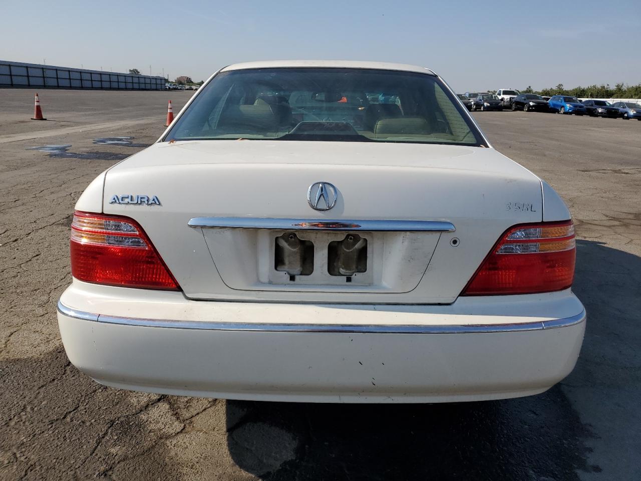 1999 Acura 3.5Rl VIN: JH4KA9655XC005540 Lot: 65012254