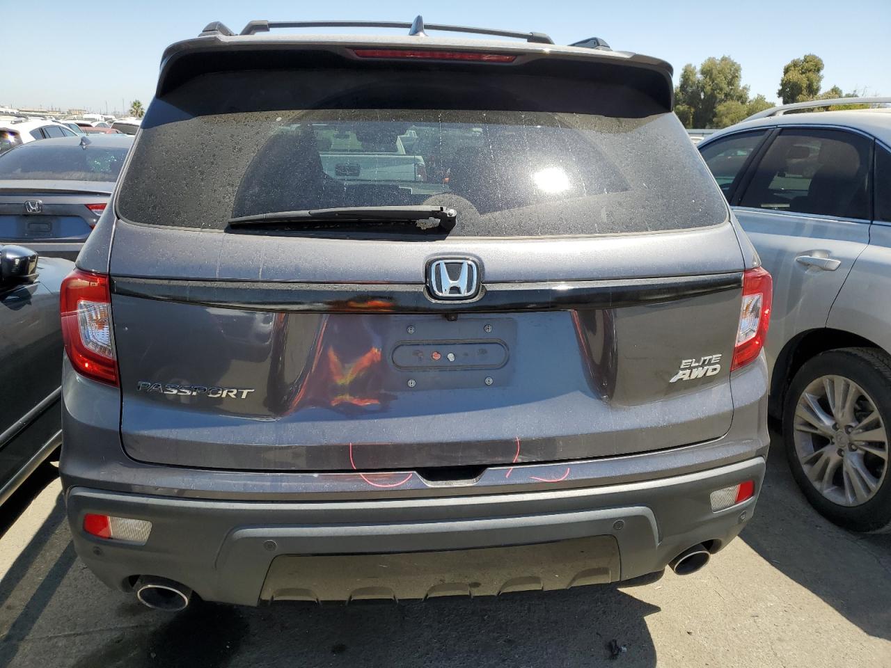 2019 Honda Passport Elite VIN: 5FNYF8H01KB015356 Lot: 65678624
