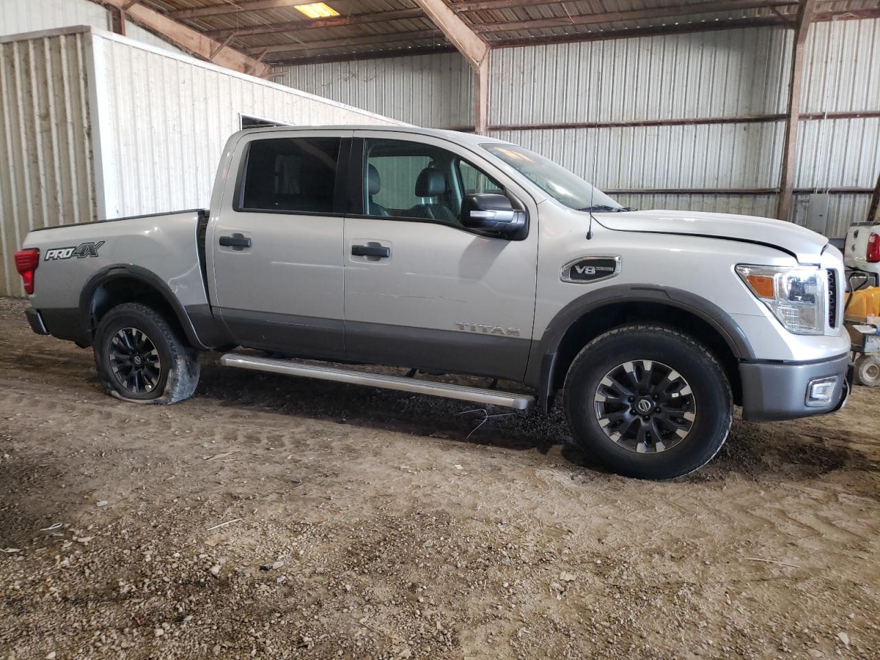 VIN 1N6AA1E58HN568830 2017 NISSAN TITAN no.4