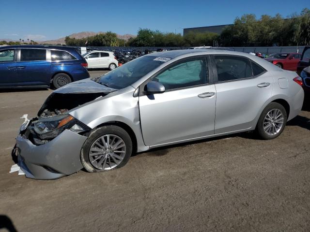 Седани TOYOTA COROLLA 2015 Сріблястий