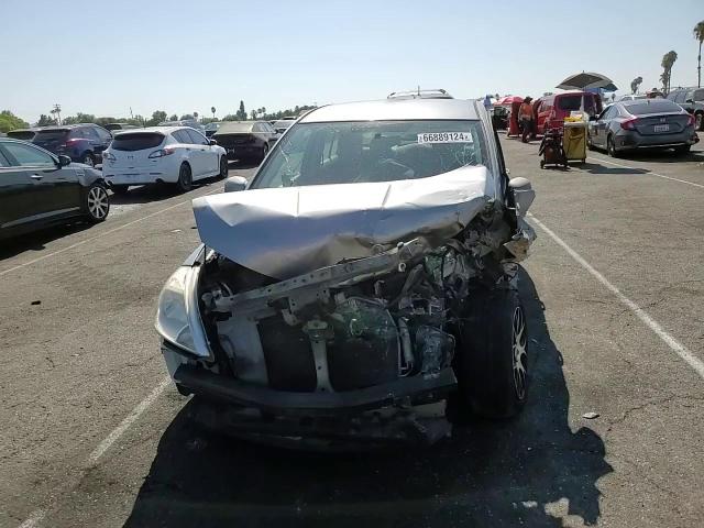 2009 Nissan Versa S VIN: 3N1BC11E89L409415 Lot: 66889124