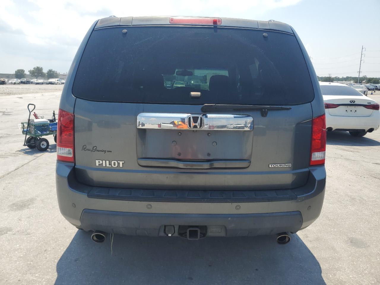 2010 Honda Pilot Touring VIN: 5FNYF3H93AB021689 Lot: 65752534
