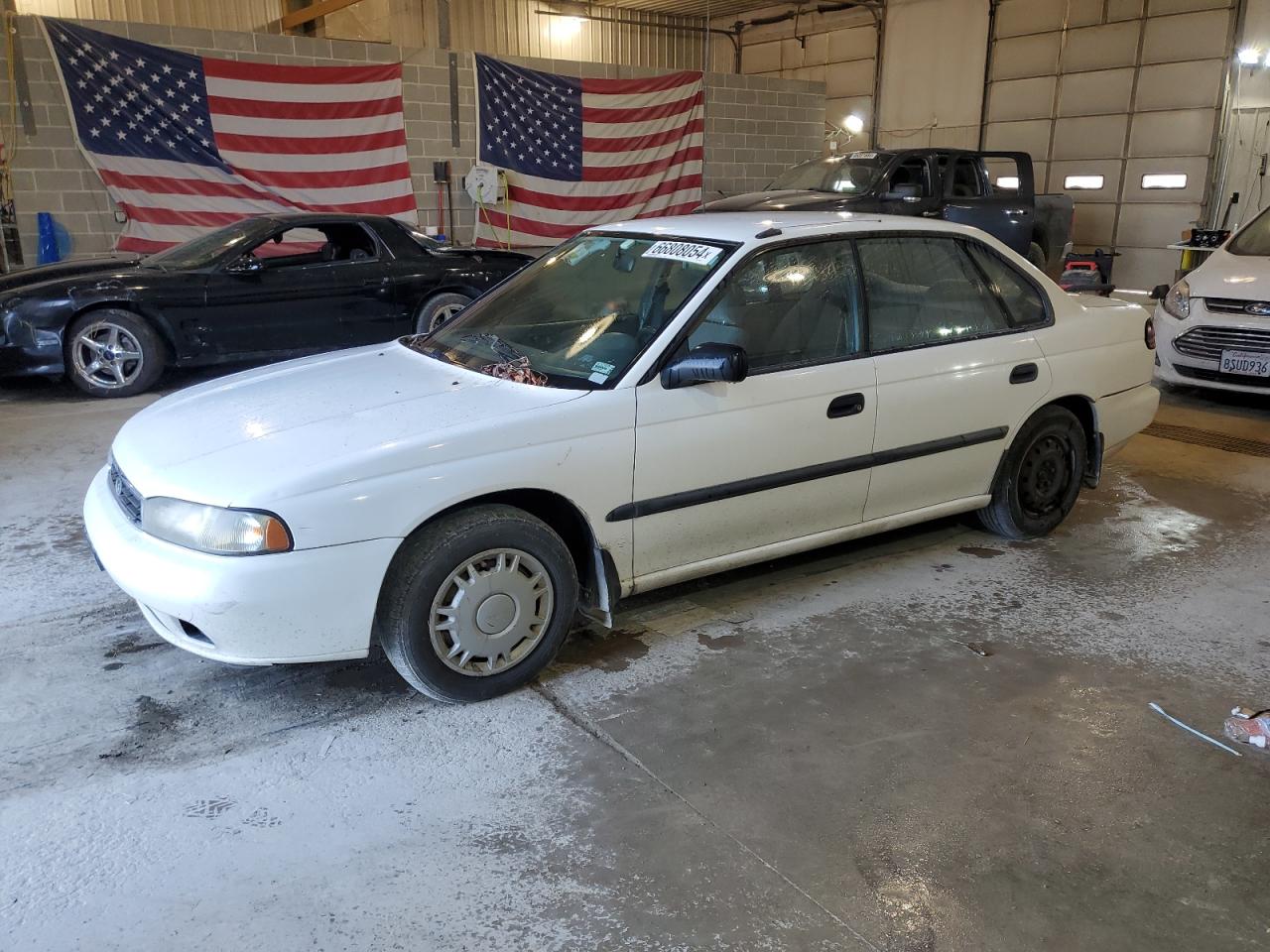 1997 Subaru Legacy L VIN: 4S3BD4351V7214036 Lot: 66808054