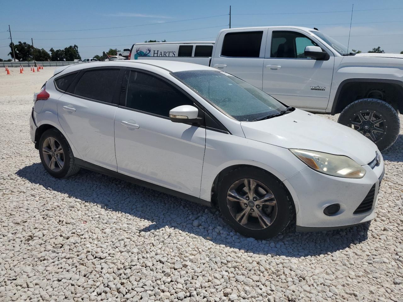 VIN 1FADP3K26EL415610 2014 FORD FOCUS no.4