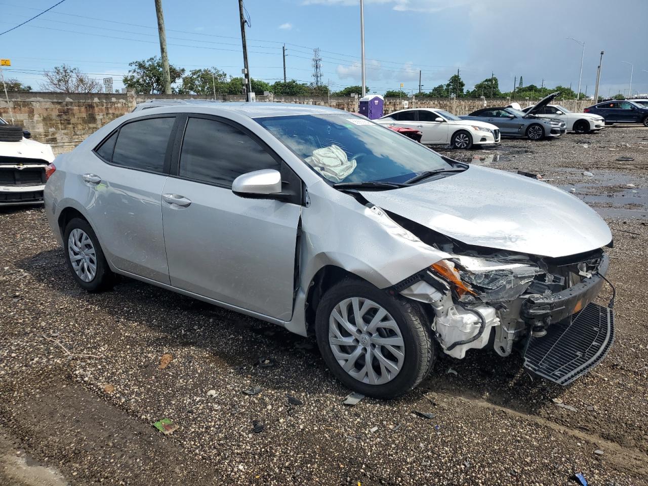 VIN 5YFBURHE2KP869077 2019 TOYOTA COROLLA no.4