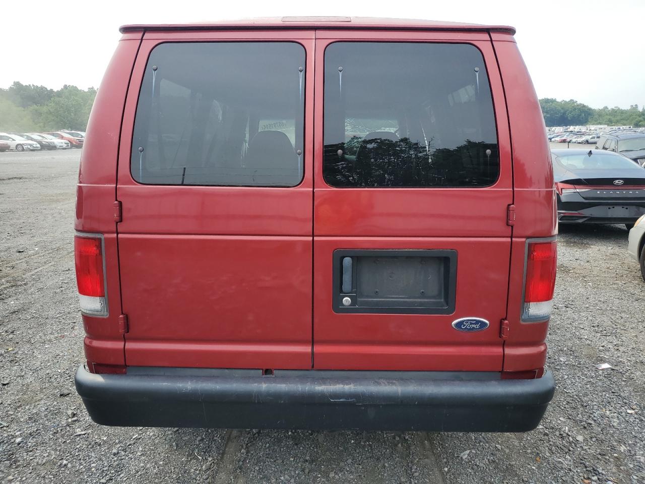 2001 Ford Econoline E150 Wagon VIN: 1FMRE11W41HB18424 Lot: 65791614