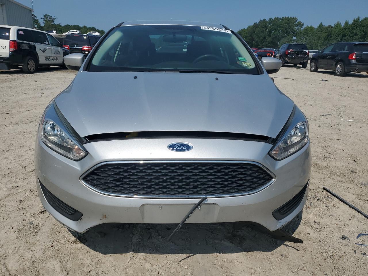 2018 Ford Focus Se VIN: 1FADP3F23JL200500 Lot: 64766594