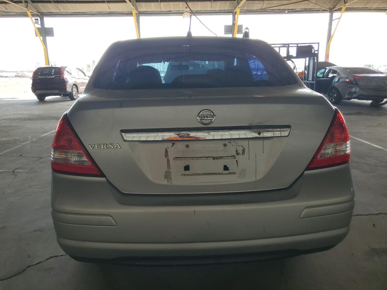 2010 Nissan Versa S VIN: 3N1BC1AP0AL360765 Lot: 65414954