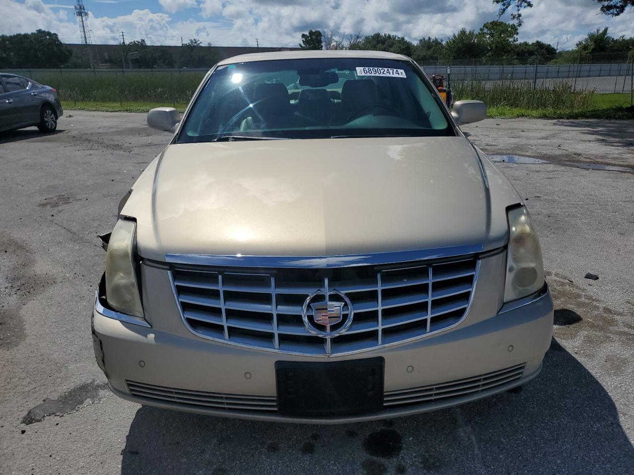 2009 Cadillac Dts VIN: 1G6KD57Y19U141870 Lot: 68902474