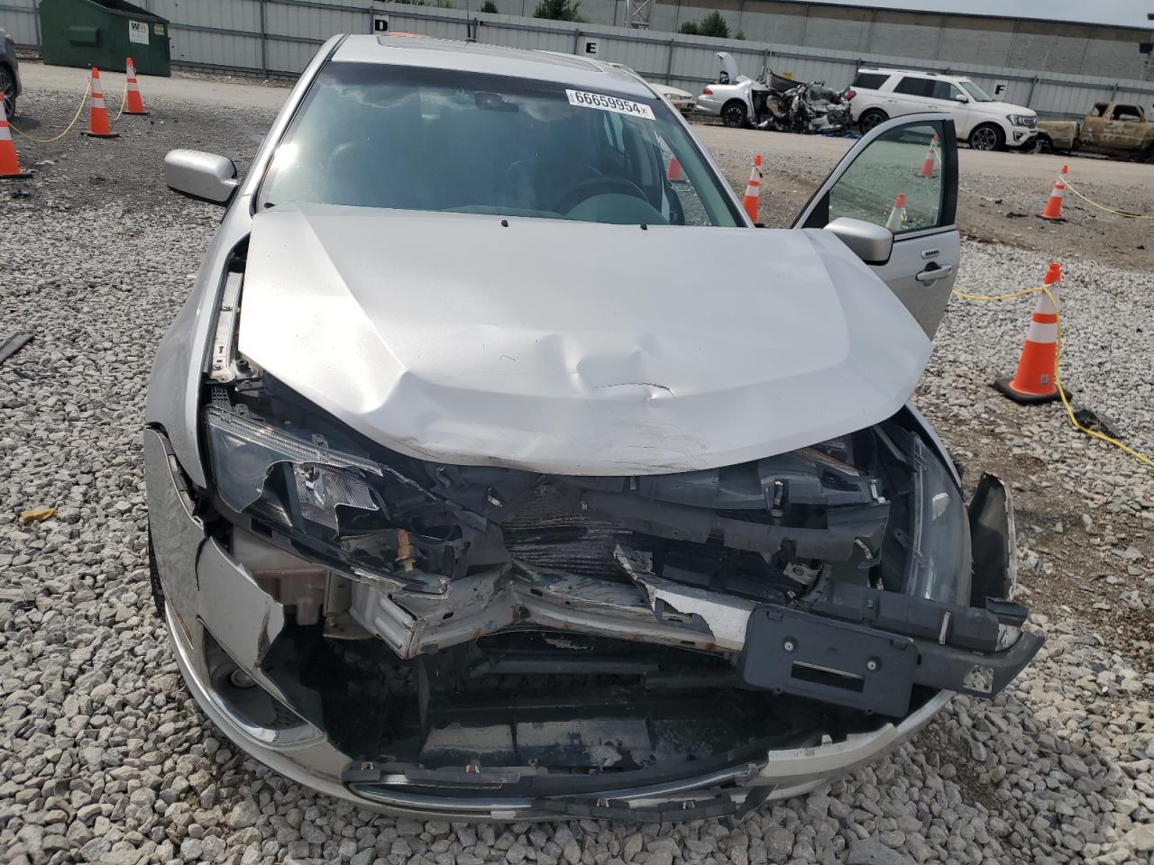 2012 Ford Fusion Hybrid VIN: 3FADP0L31CR282243 Lot: 66659954