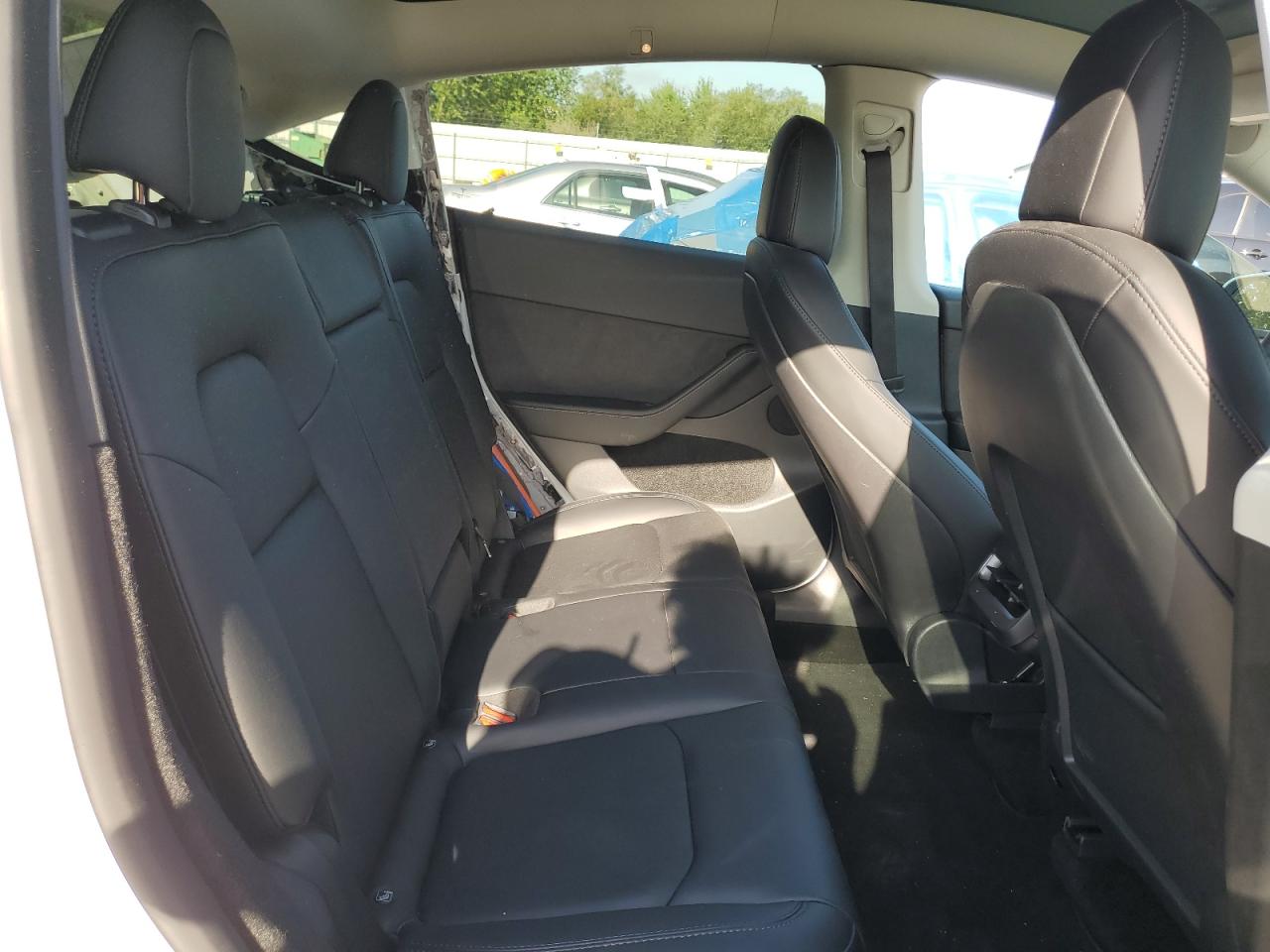 2023 Tesla Model Y VIN: 7SAYGDEE1PF621126 Lot: 65863804