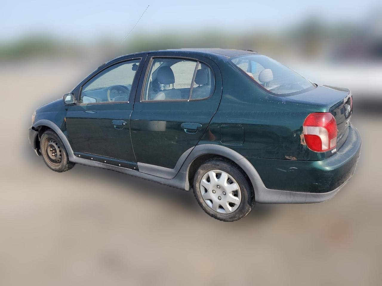 2000 Toyota Echo VIN: JTDBT1236Y0099299 Lot: 65713474