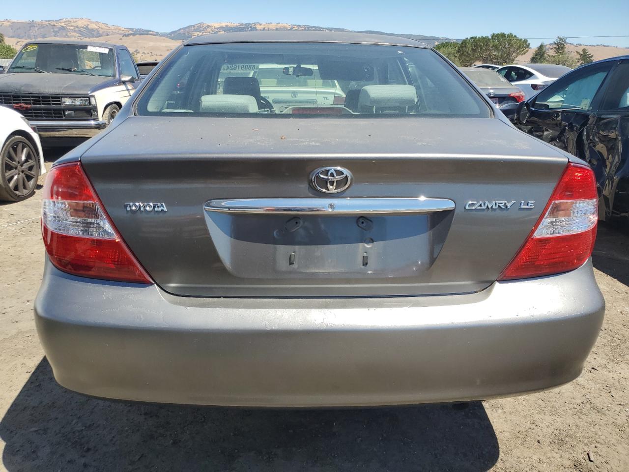 2003 Toyota Camry Le VIN: JTDBE32KX30238520 Lot: 68091624