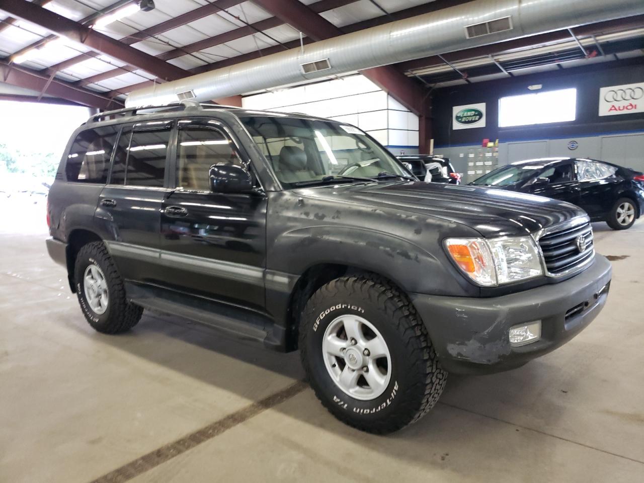 1999 Toyota Land Cruiser VIN: JT3HT05J2X0064180 Lot: 66560574