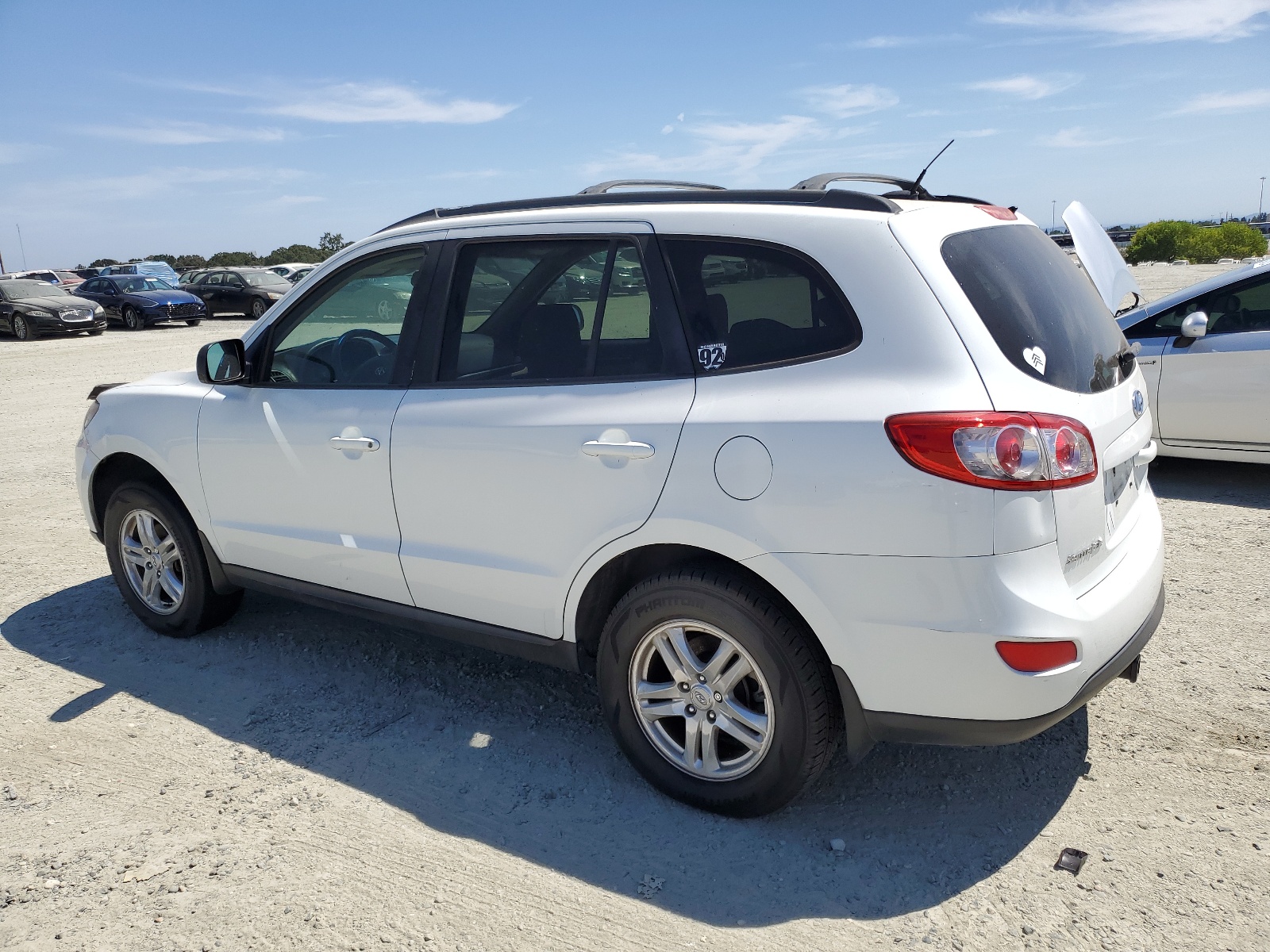 2012 Hyundai Santa Fe Gls vin: 5XYZGDAB2CG117197