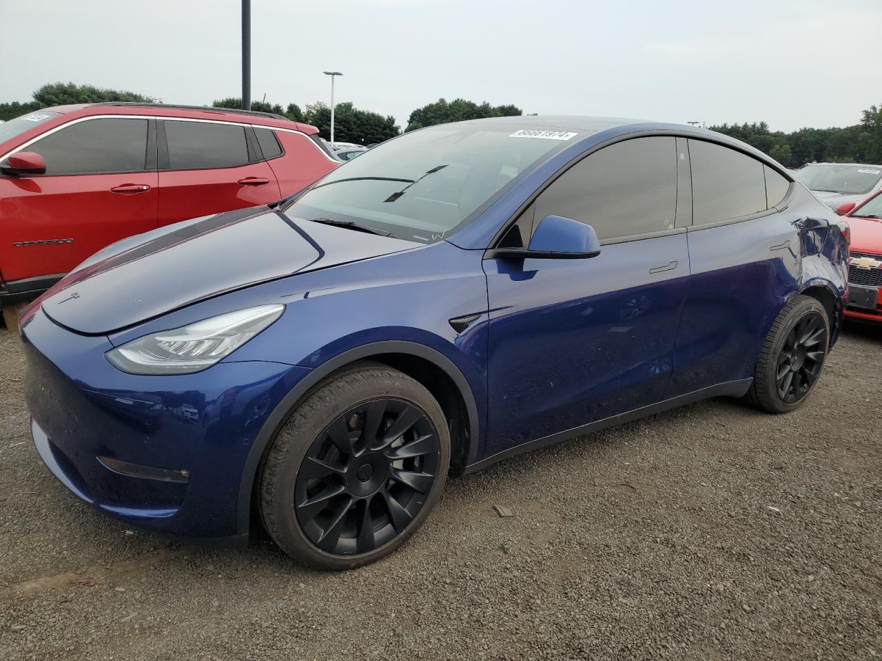 2021 Tesla Model Y VIN: 5YJYGUEE3NS267660 Lot: 66661974