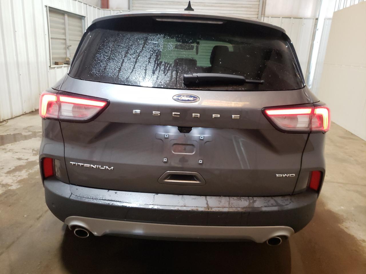 2021 Ford Escape Titanium VIN: 1FMCU9J98MUA57771 Lot: 66899464