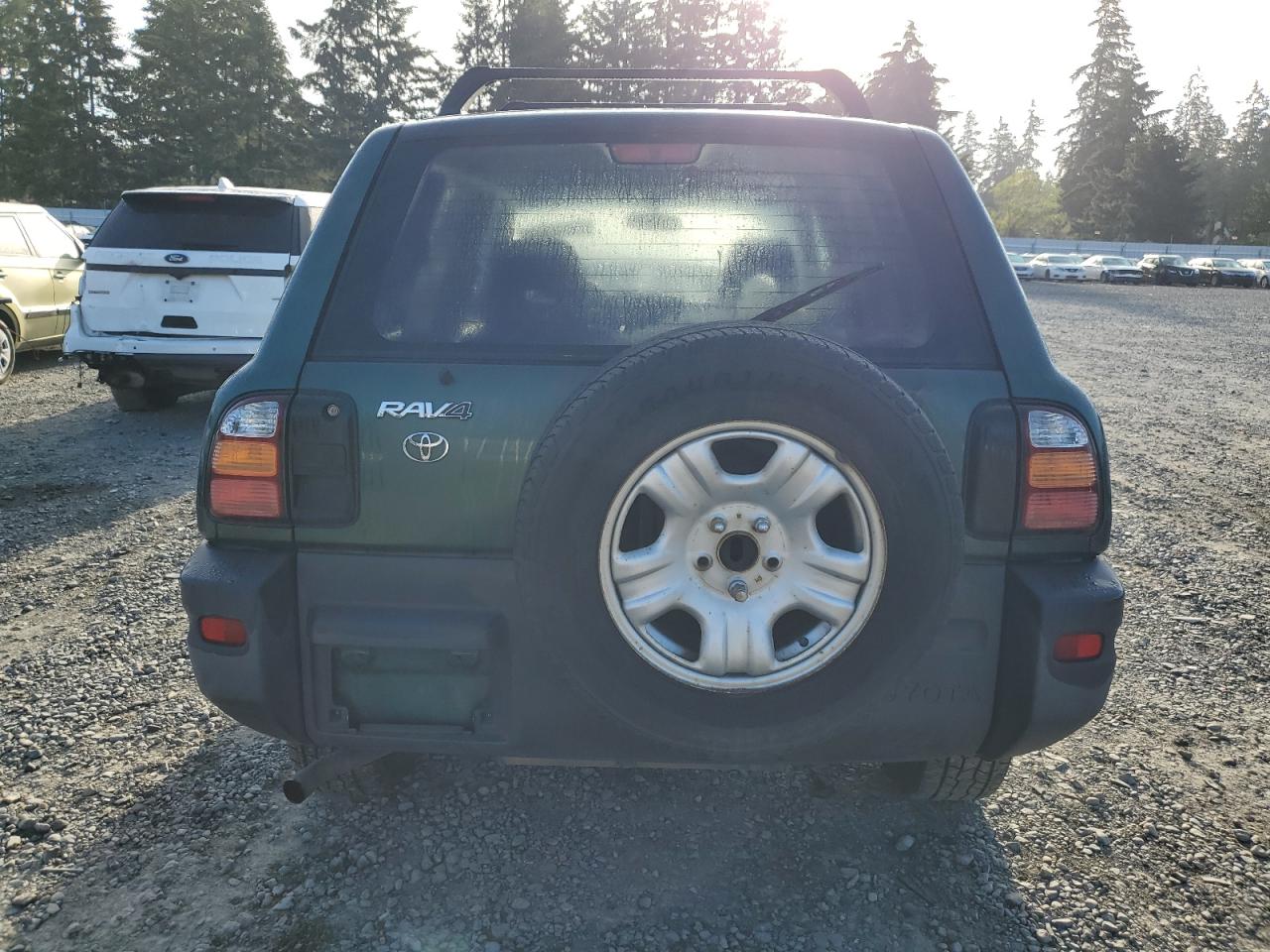 1999 Toyota Rav4 VIN: JT3HP10V3X0212373 Lot: 69211334