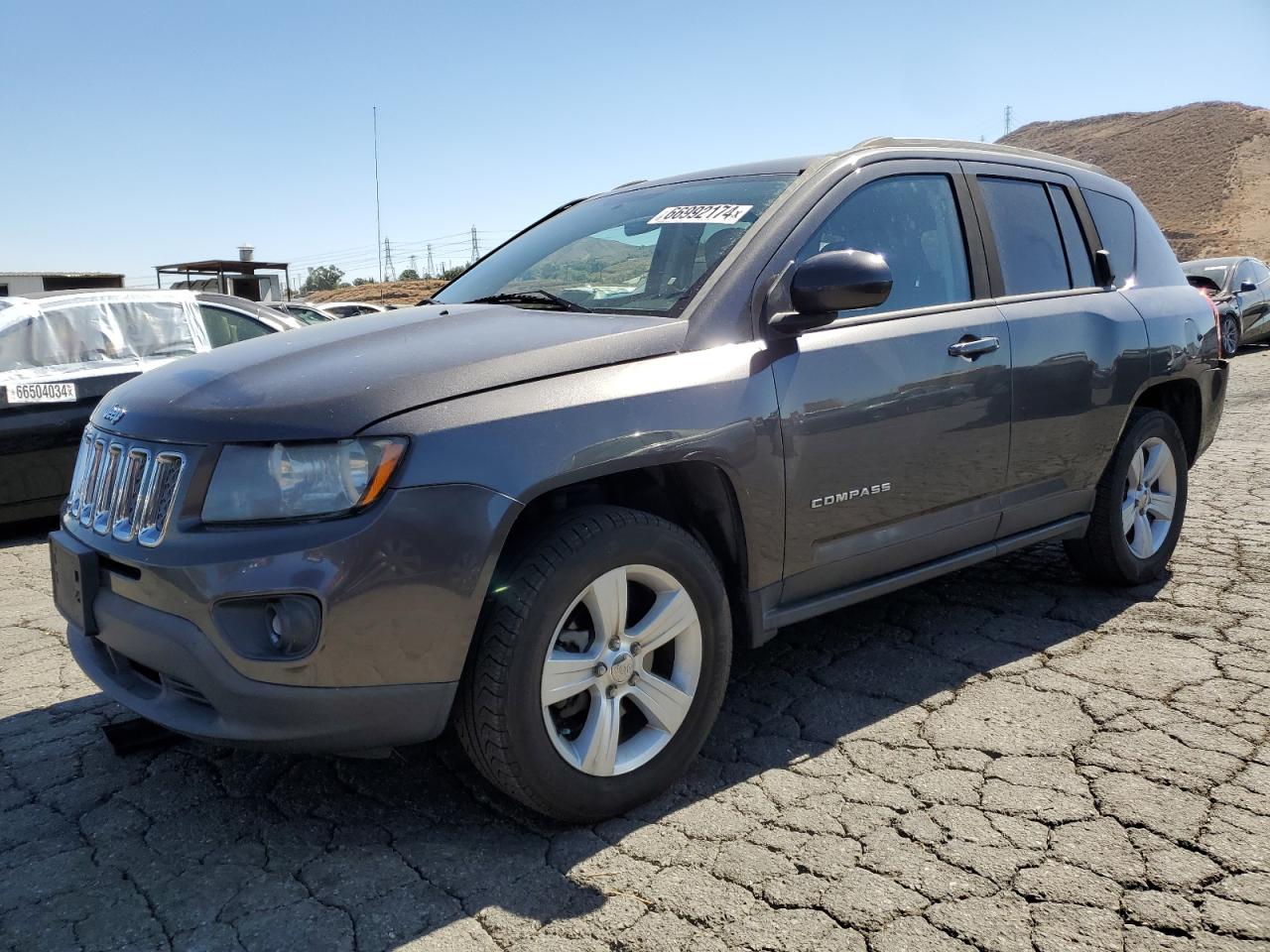 2015 Jeep Compass Latitude VIN: 1C4NJDEB0FD216565 Lot: 66992174