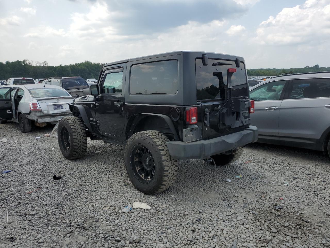 2014 Jeep Wrangler Sport VIN: 1C4AJWAGXEL265322 Lot: 65170054