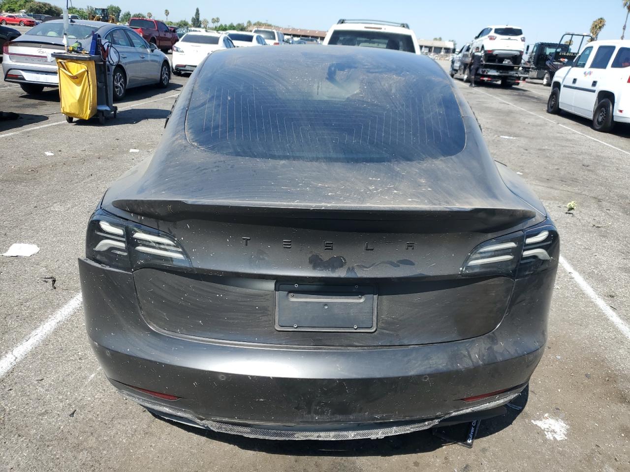 2020 Tesla Model 3 VIN: 5YJ3E1EAXLF705190 Lot: 65826894