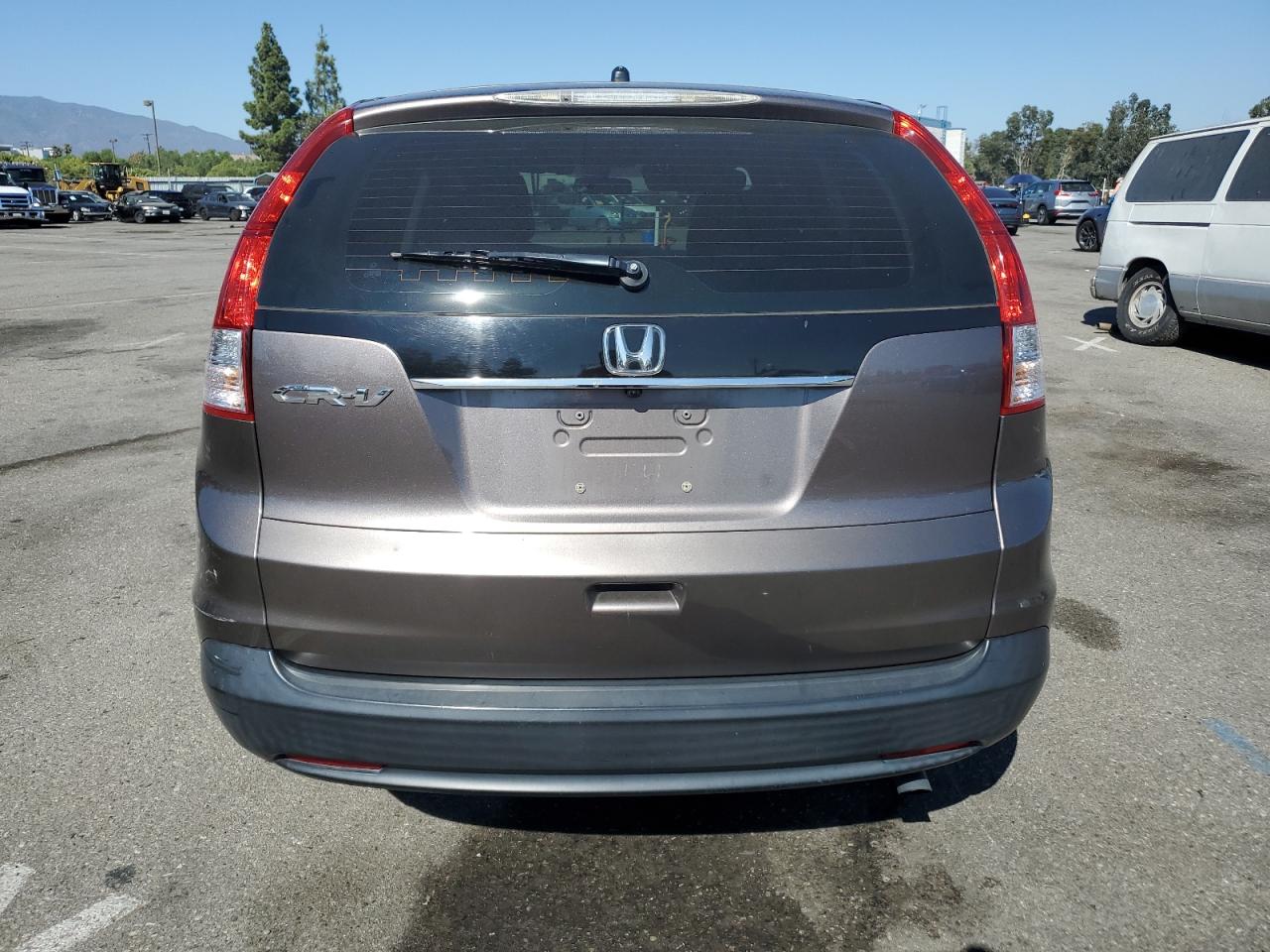 2013 Honda Cr-V Lx VIN: 3CZRM3H36DG706512 Lot: 69065334