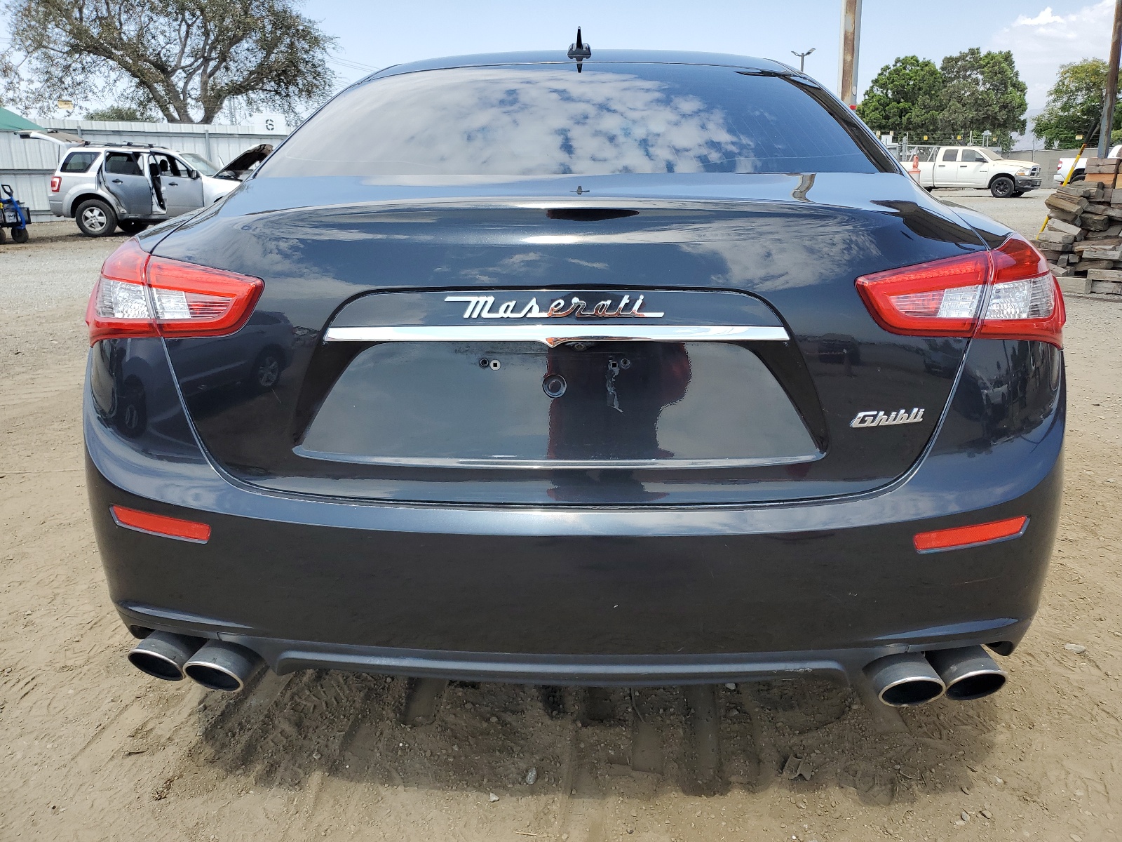 2014 Maserati Ghibli vin: ZAM57XSA5E1090243