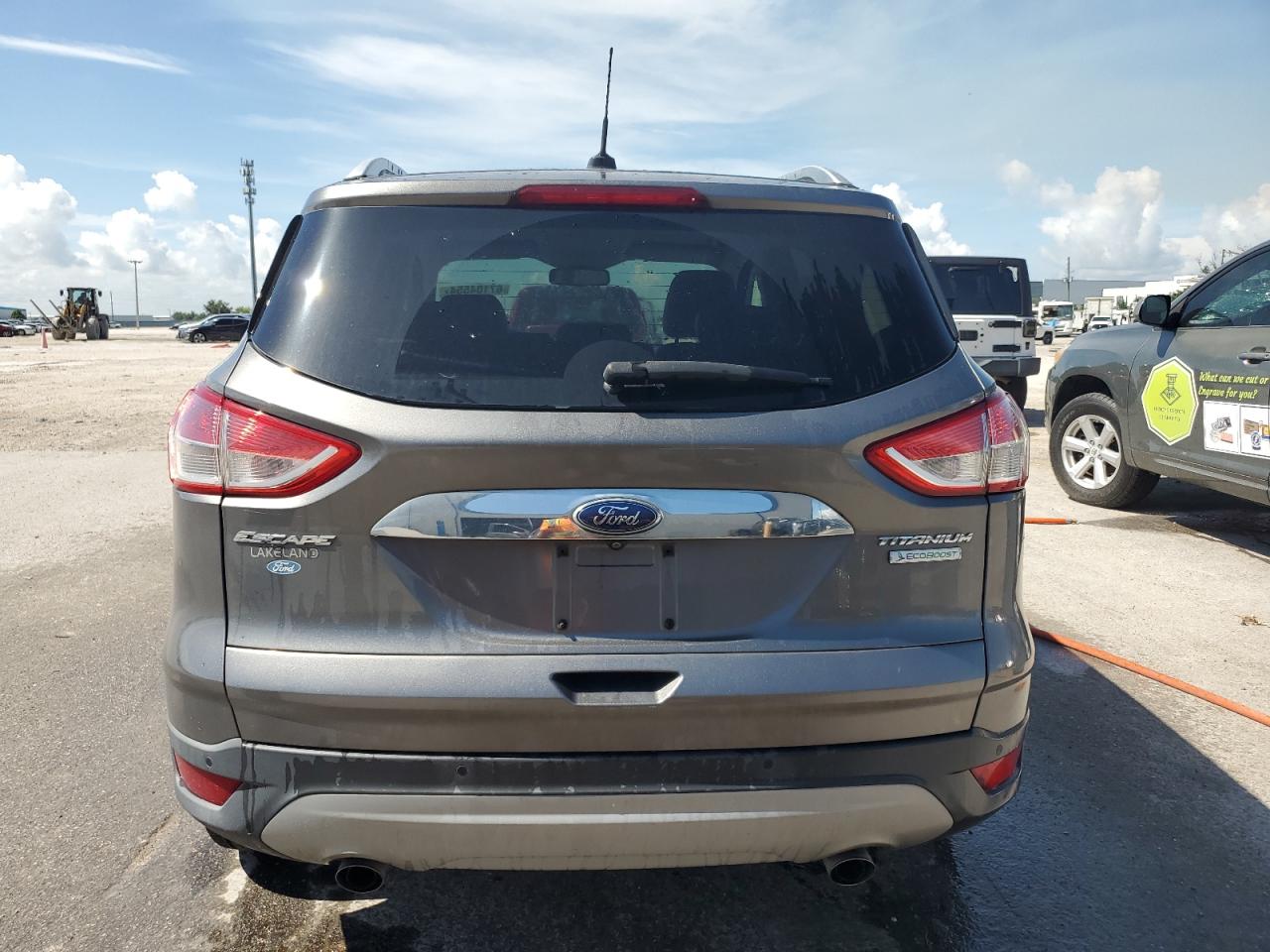 2014 Ford Escape Titanium VIN: 1FMCU0J93EUE57802 Lot: 67104554