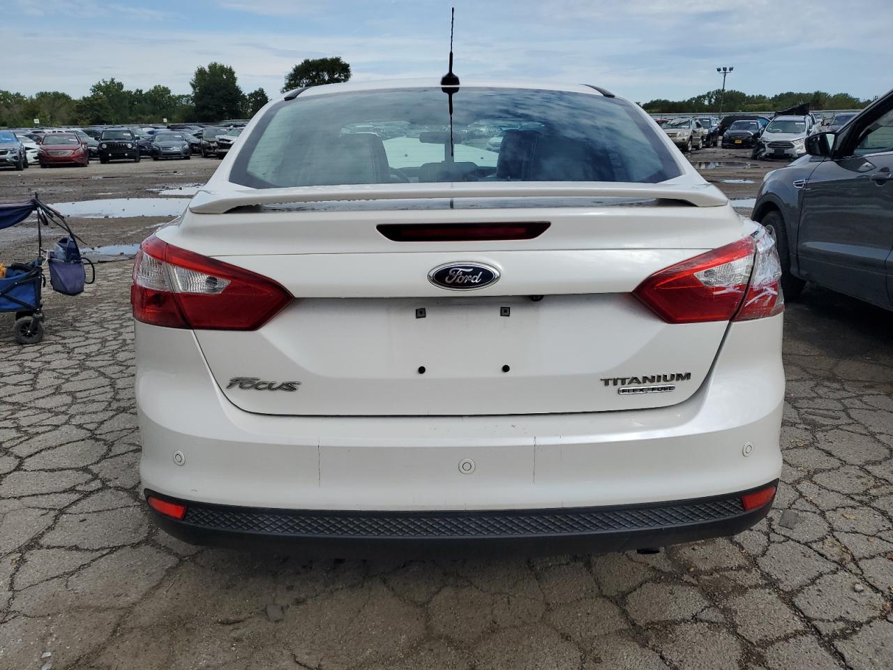 2013 Ford Focus Titanium VIN: 1FADP3J20DL208968 Lot: 69159384