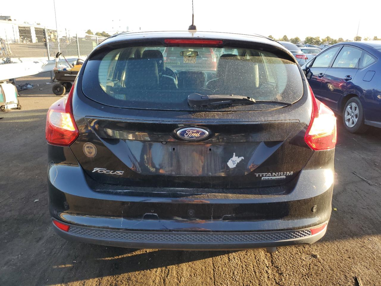 2014 Ford Focus Titanium VIN: 1FADP3N28EL303449 Lot: 66036684