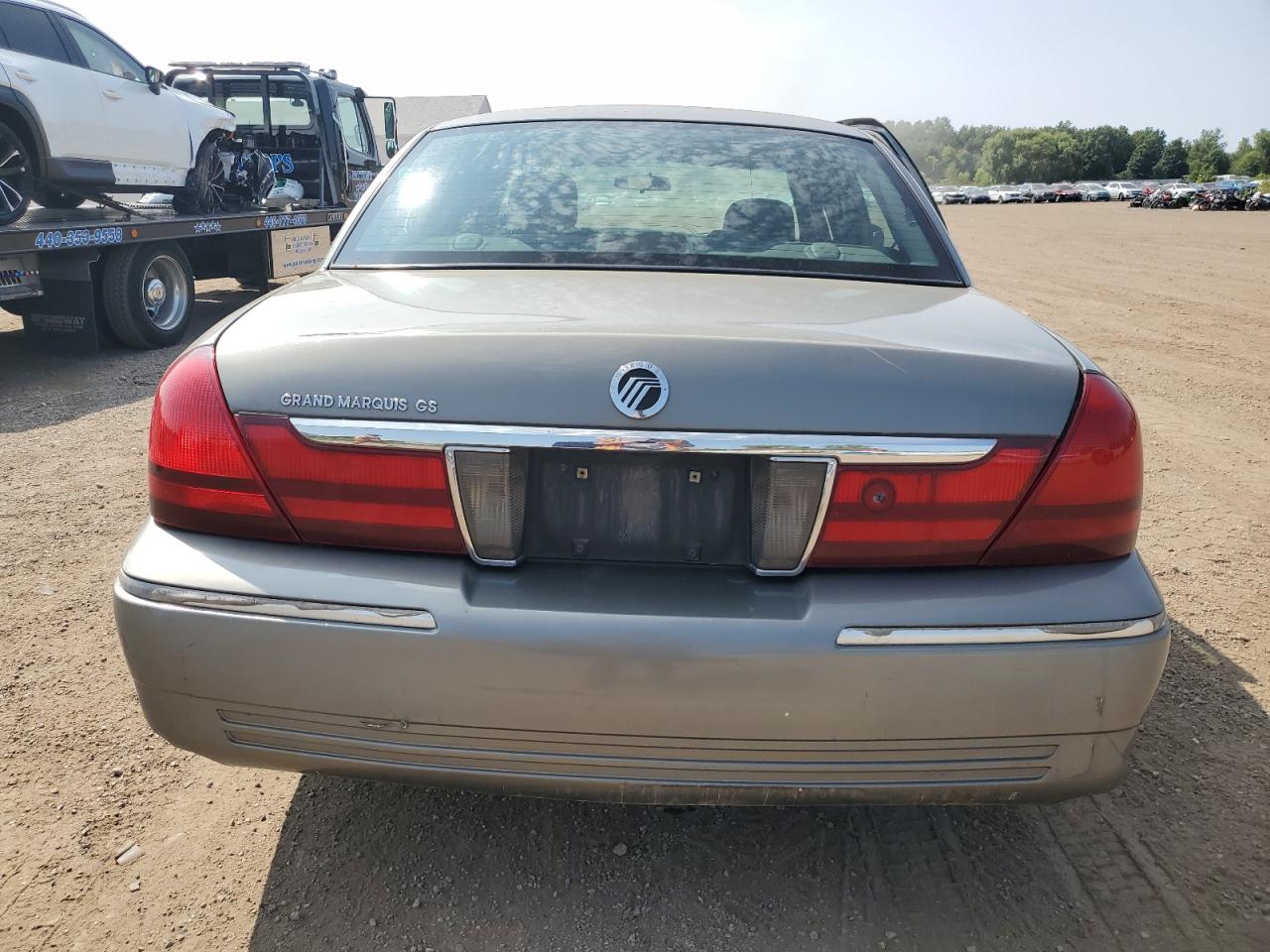 2003 Mercury Grand Marquis Gs VIN: 2MEFM74WX3X615956 Lot: 68770604