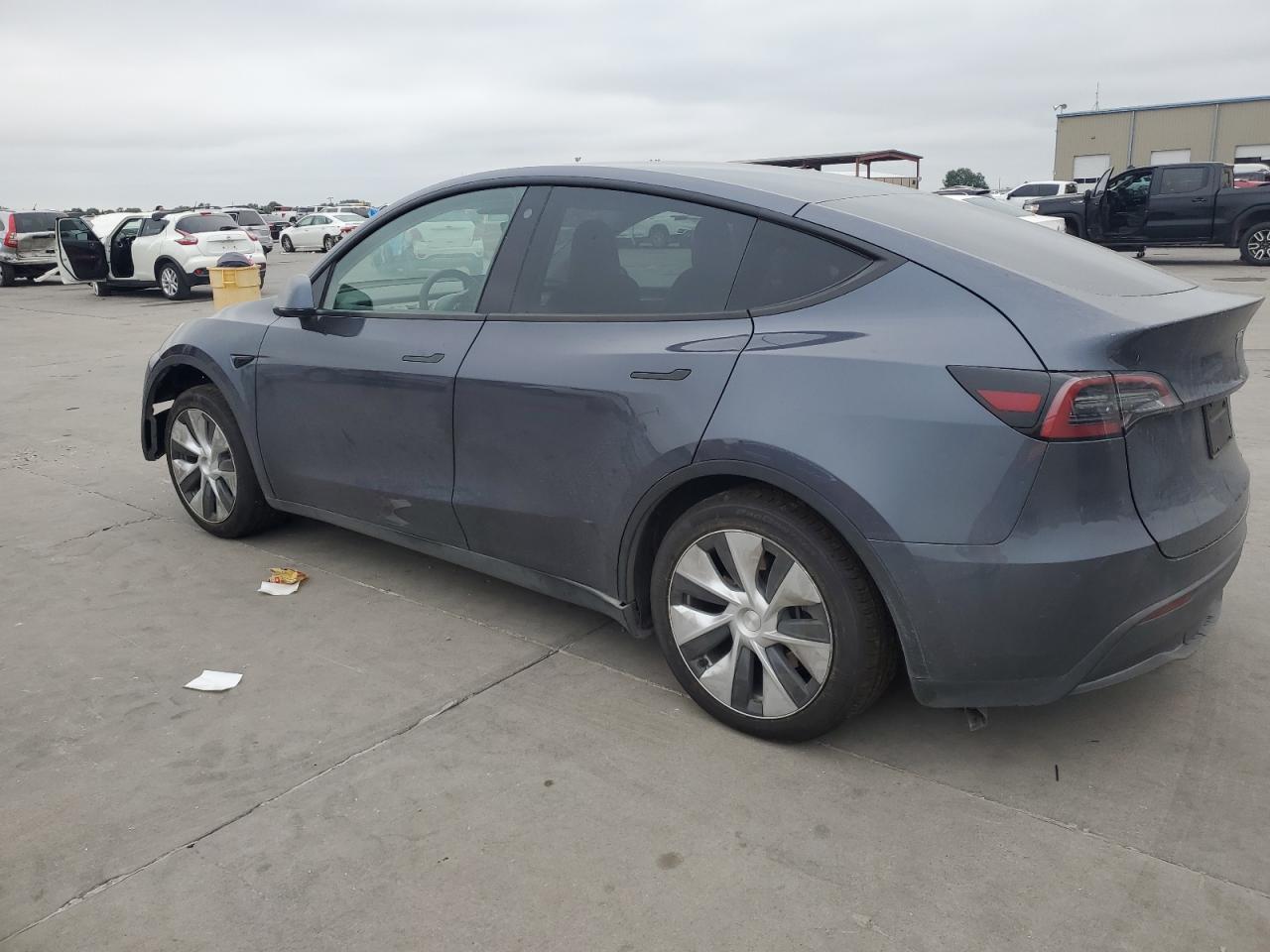 2023 Tesla Model Y VIN: 7SAYGAEE4PF614962 Lot: 69672554