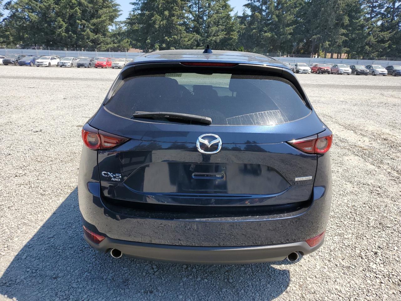 2021 Mazda Cx-5 Touring VIN: JM3KFBCM8M1424163 Lot: 66249604