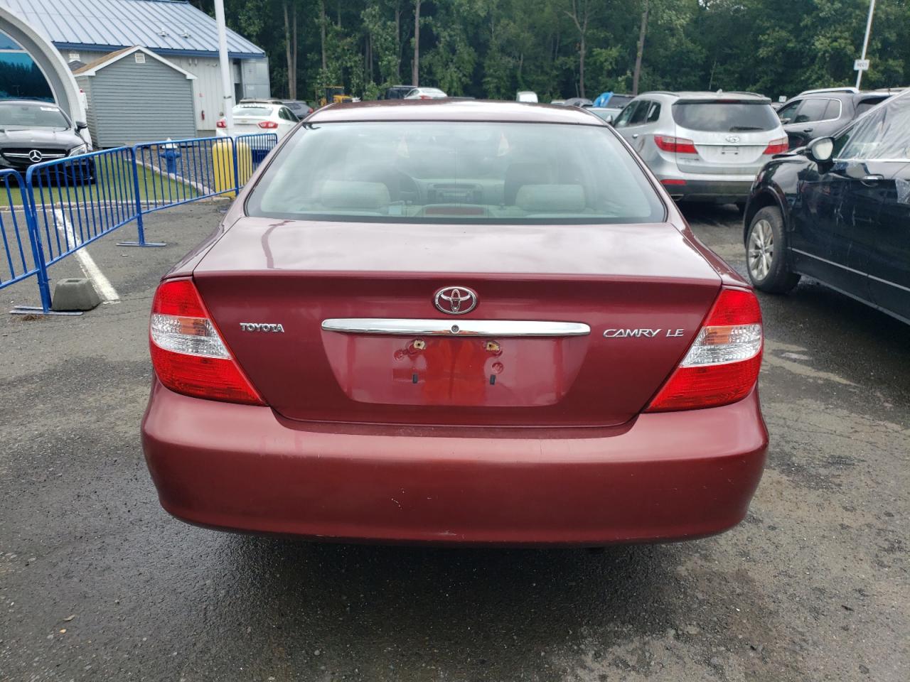 2003 Toyota Camry Le VIN: 4T1BE32KX3U250932 Lot: 66629434
