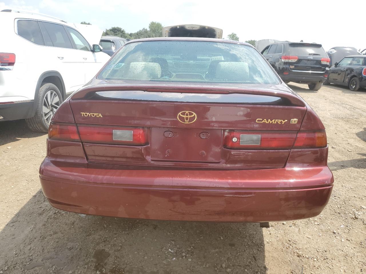 1999 Toyota Camry Ce VIN: 4T1BG22K0XU569010 Lot: 67501074