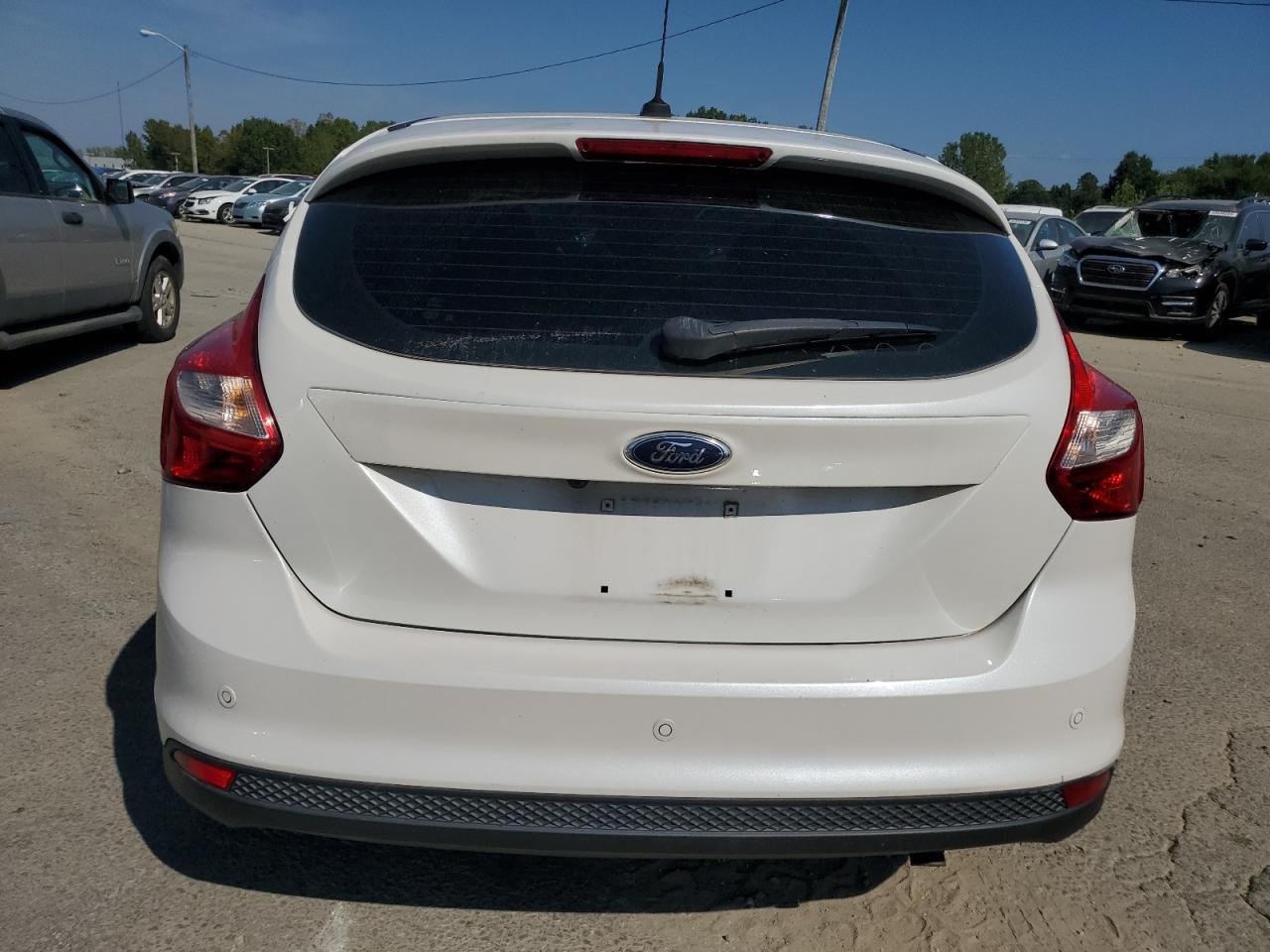 2013 Ford Focus Titanium VIN: 1FADP3N27DL162842 Lot: 68875384