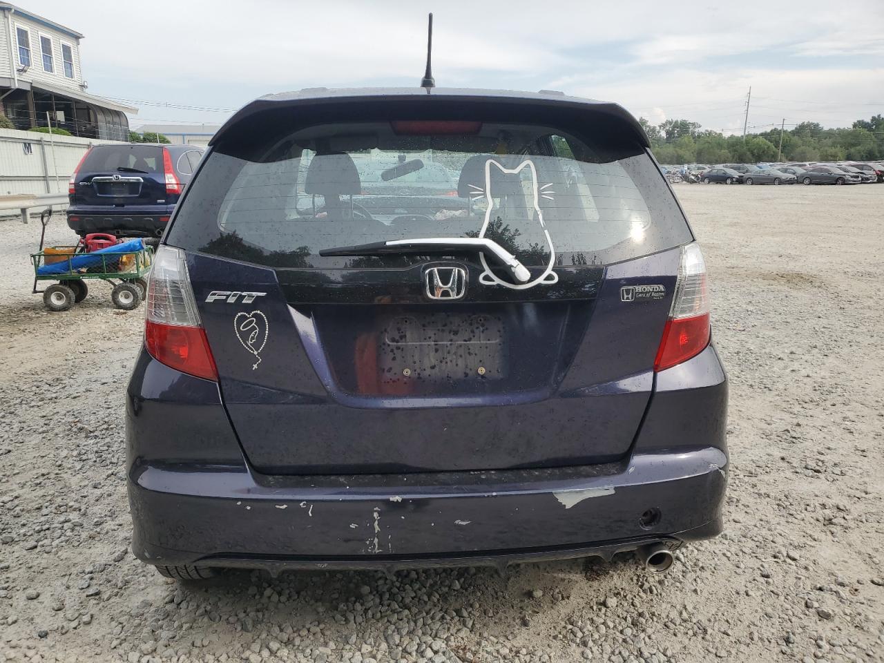 2009 Honda Fit Sport VIN: JHMGE88449S071143 Lot: 69073514