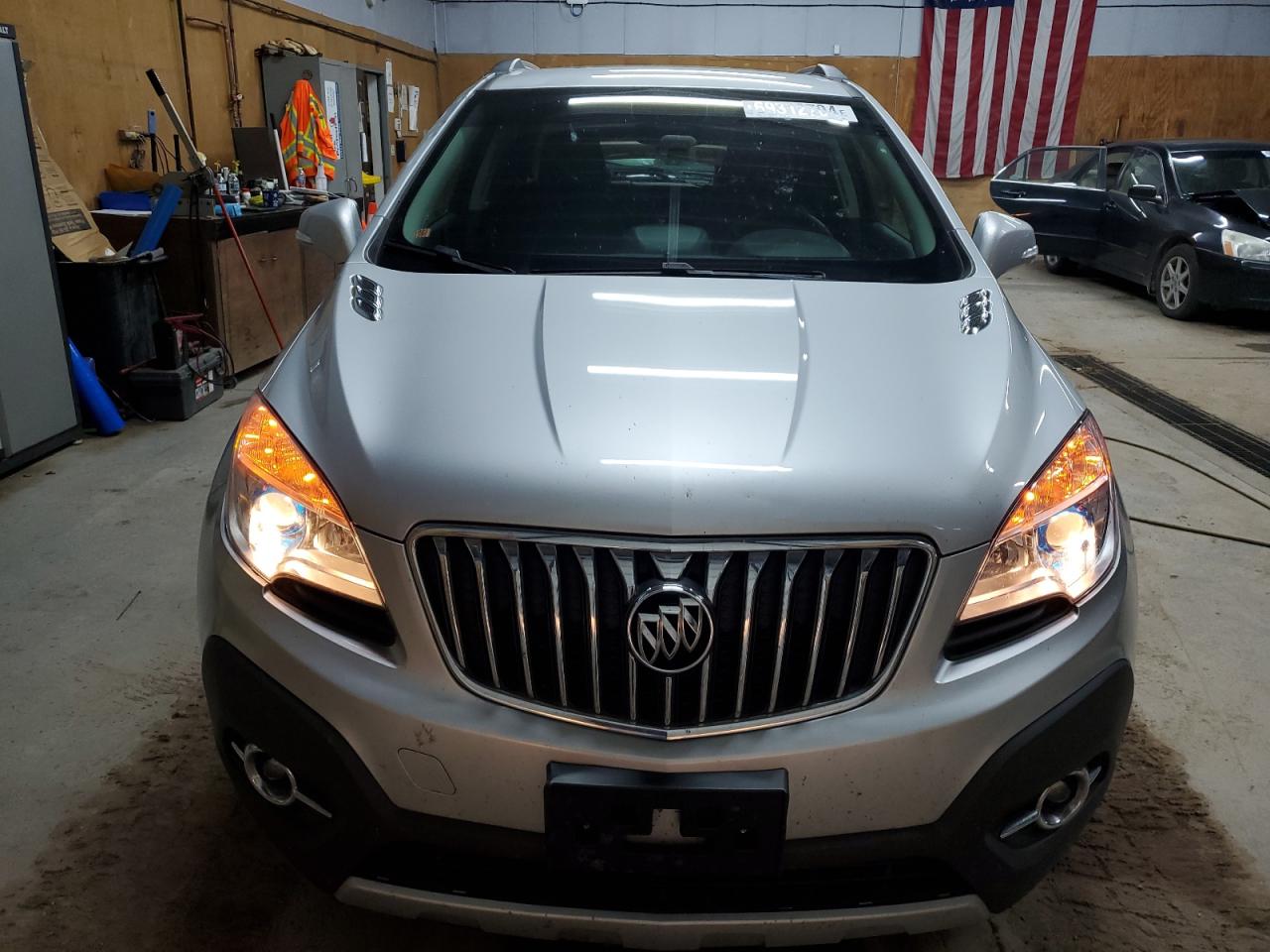 2015 BUICK ENCORE with REAR END damage, VIN KL4CJGSB0FB093868