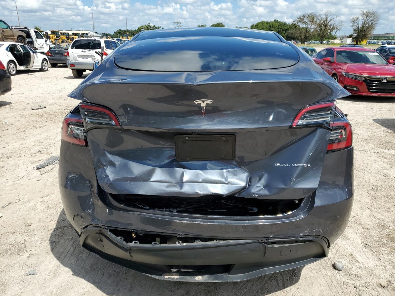 2023 Tesla Model Y VIN: 7SAYGAEE6PF661104 Lot: 69421904