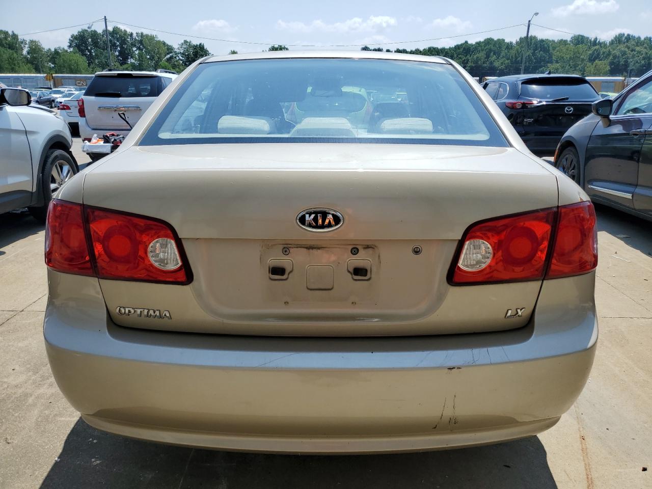 2006 Kia Optima Lx VIN: KNAGE123765063103 Lot: 65905994