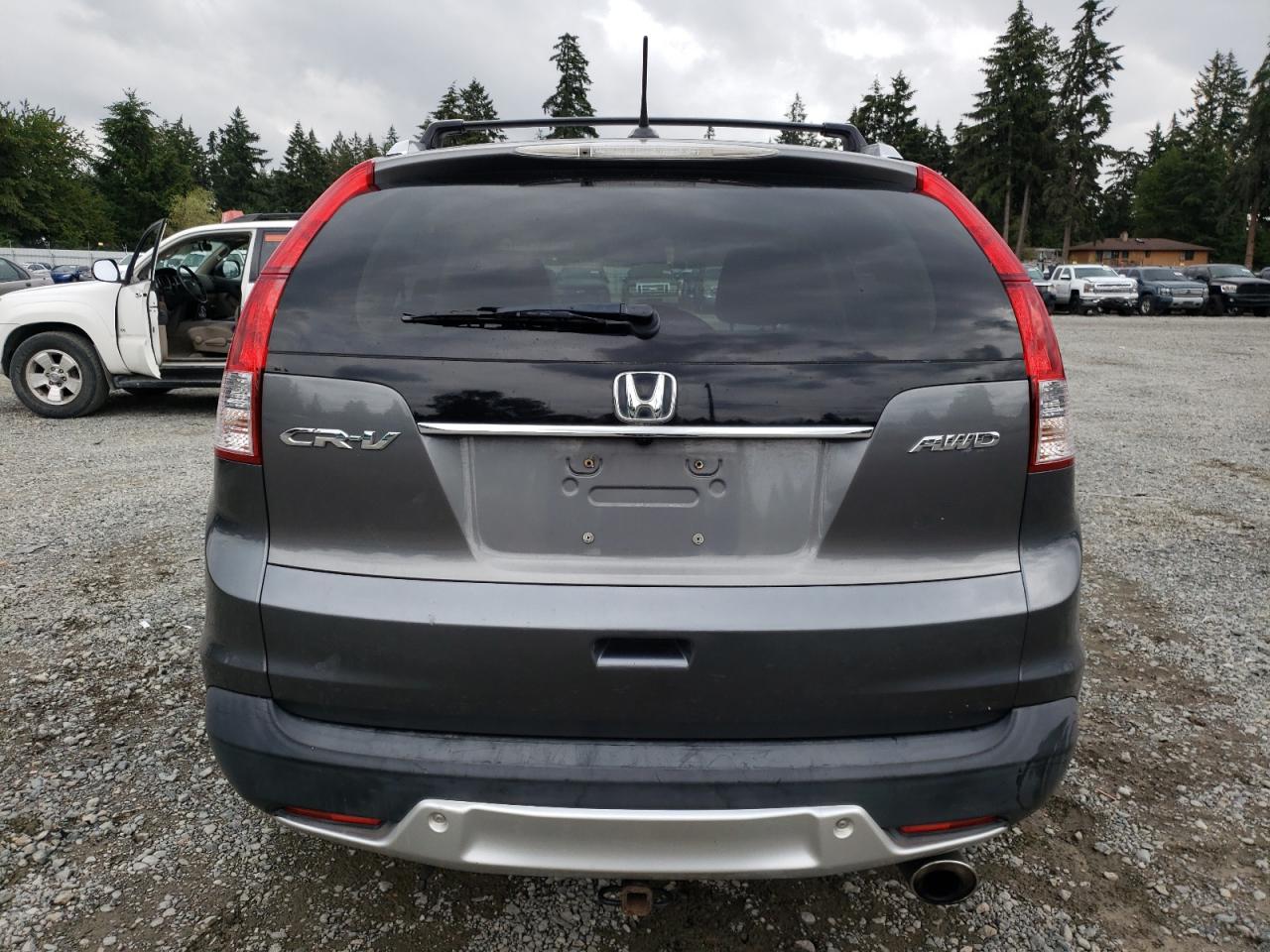 2012 Honda Cr-V Exl VIN: JHLRM4H72CC027548 Lot: 68682944