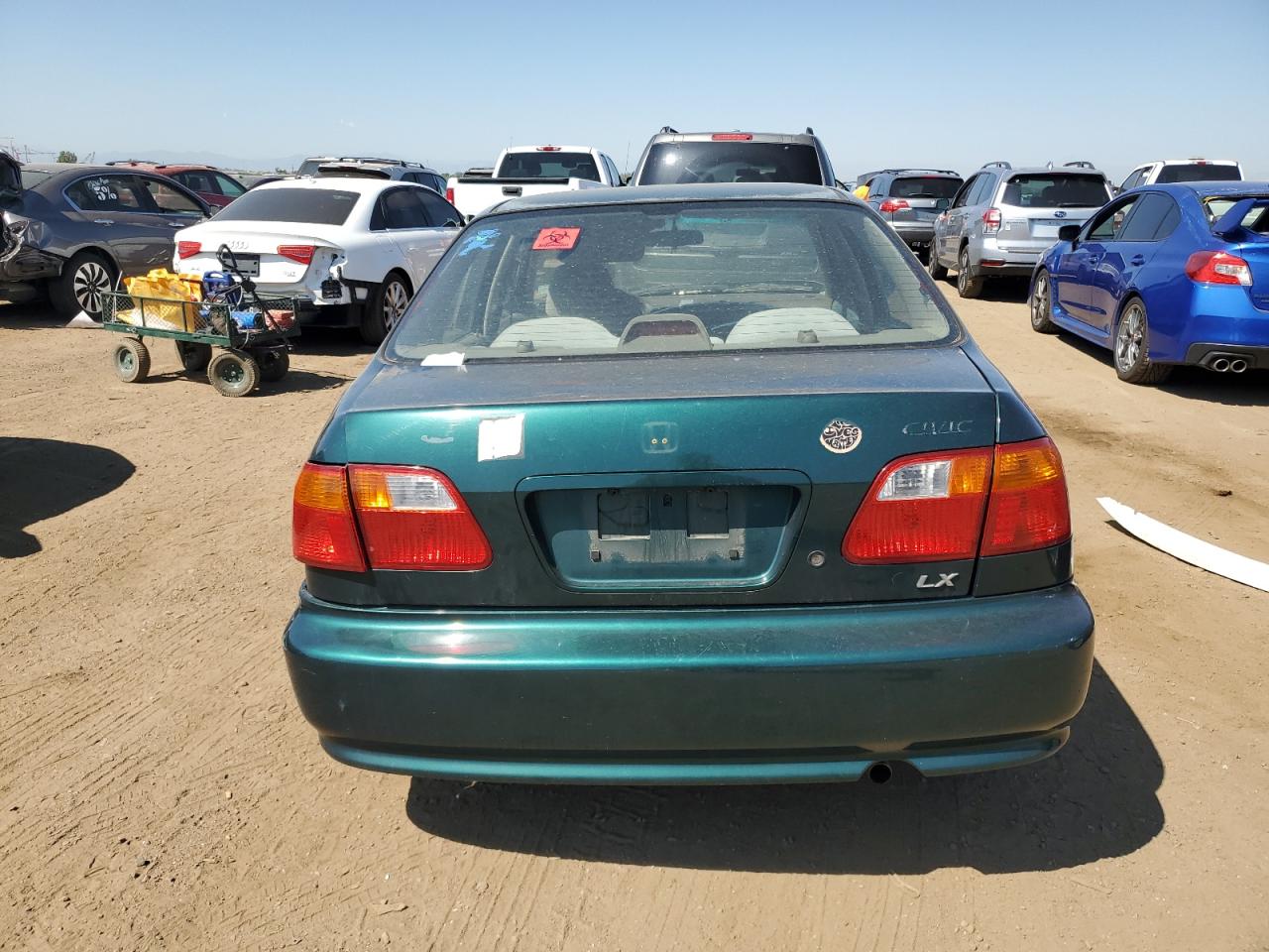 2000 Honda Civic Lx VIN: JHMEJ6674YS003007 Lot: 69257214