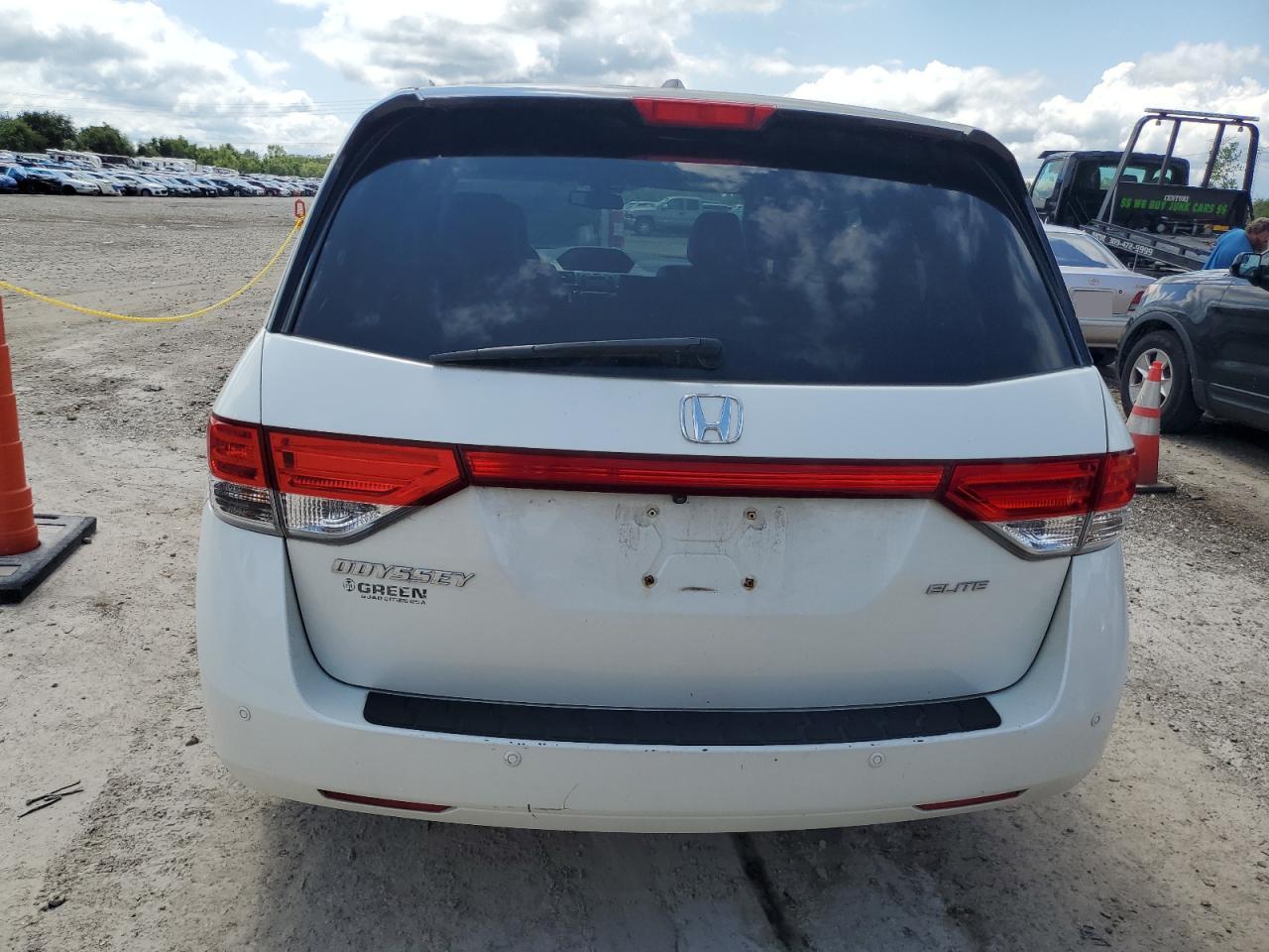 2016 Honda Odyssey Touring VIN: 5FNRL5H90GB022090 Lot: 66027254