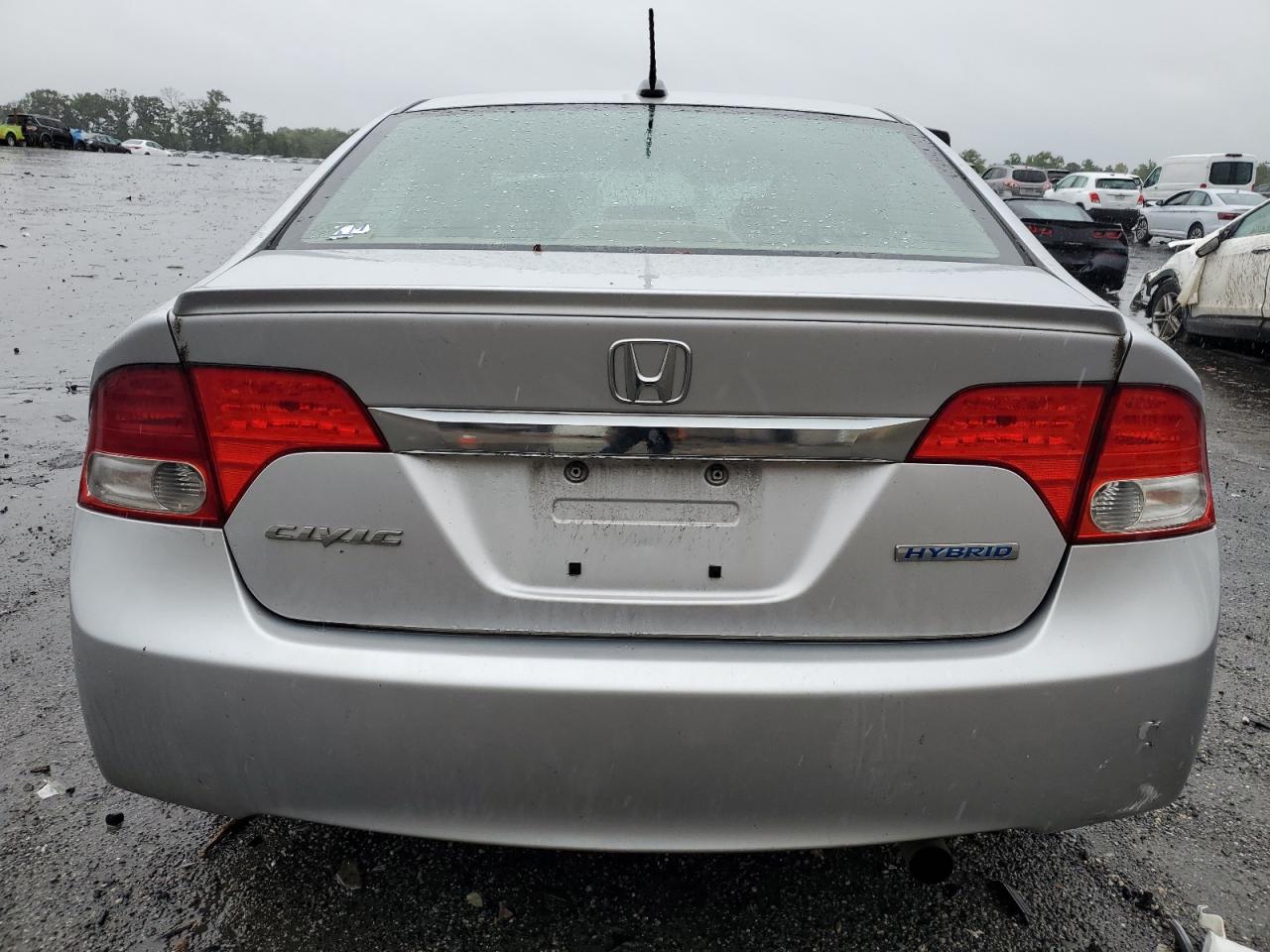 2010 Honda Civic Hybrid VIN: JHMFA3F25AS003191 Lot: 64833414