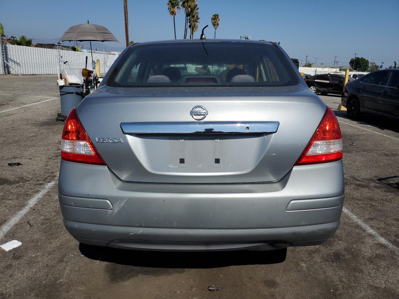 2009 Nissan Versa S VIN: 3N1BC11E89L409415 Lot: 66889124