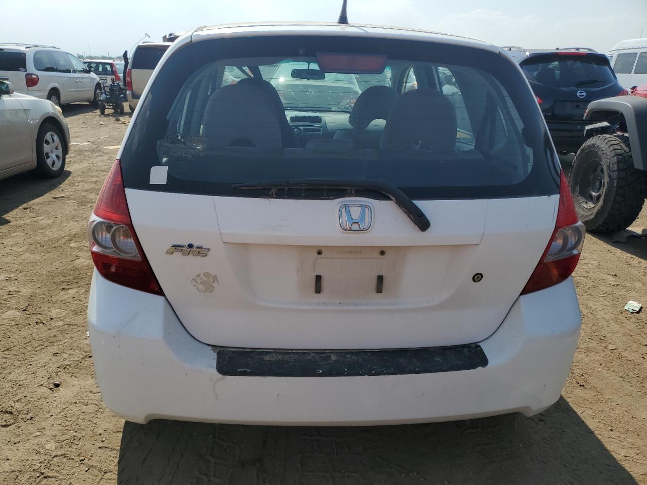 2007 Honda Fit VIN: JHMGD38417S003398 Lot: 65576574