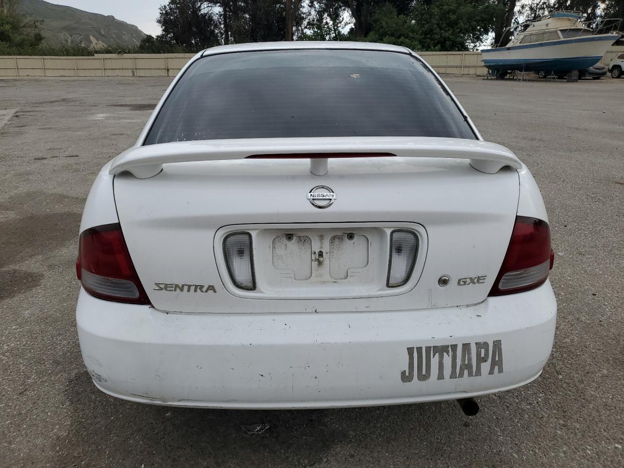 2003 Nissan Sentra Xe VIN: 3N1CB51D43L817648 Lot: 65121354