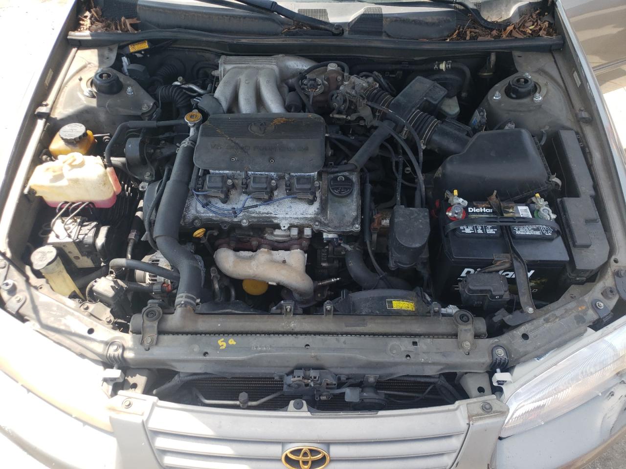 1999 Toyota Camry Le VIN: 4T1BF22K5XU075602 Lot: 67153884